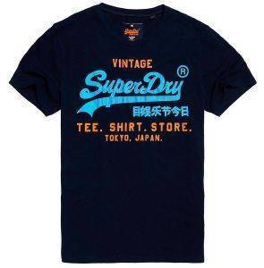 T-SHIRT SUPERDRY D1 SHOP DUO LITE ΣΚΟΥΡΟ ΜΠΛΕ (L) T-SHIRT SUPERDRY D1 SHOP DUO LITE ΣΚΟΥΡΟ ΜΠΛΕ (L)