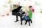      30  &  HAPE EARLY MELODIES HAPPY GRAND PIANO 